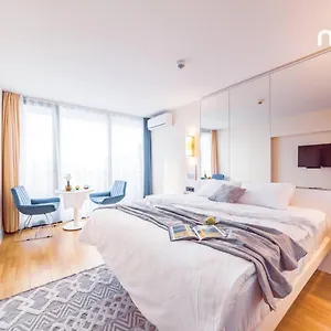 In Orbi City Official Апартаменты